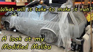 Getting my Malibu wagon running again after sitting for 14 years in the corner of the garage.