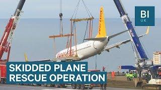 It took two cranes to recover a crashed plane in Turkey