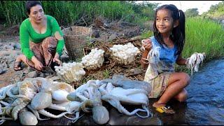 Cooking octopus spicy with mushroom for lunch- Mother pick mushroom at river