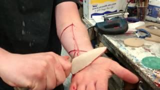 Prop blood knife with fake, trick cutting effect.