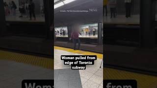 A woman is seen tiptoeing on the edge of a Toronto subway platform before a train arrives #shorts