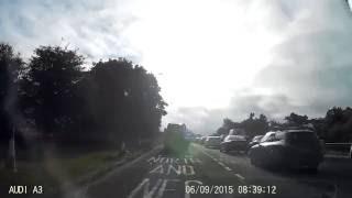 Cars illegally using hard shoulder to avoid queue