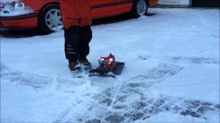 Dickie Toys Pistenbully 600 RC Snowcat plowing