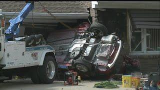 Coroner: 85-year-old woman killed when car crashed into Austintown home