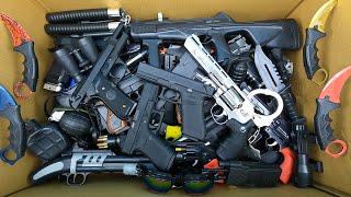 Airsoft Guns Beretta M92, Glock 17 And 18, Airguns Dan Wesson 6 Revolver And Box Of Toy Guns