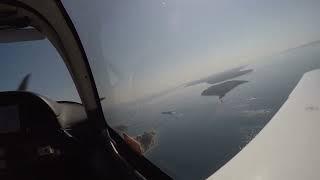 Landing at Mackinac Island KMCD featuring 1000’ freighter