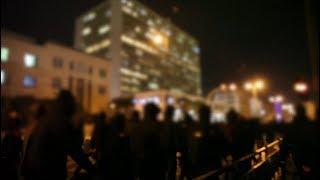 Protest and riot in response to a cop threatening to shoot students inside an Athens University