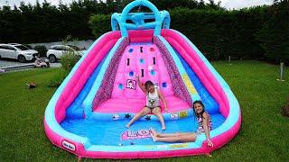 Masal and Öykü Pretend Play with Water Slide Inflatable Toys