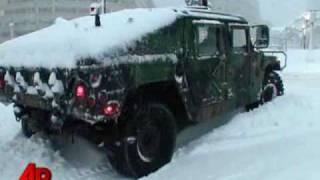 Raw Video: Military Vehicle Gets Stuck in Snow