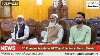 DC, Dr Basharat Qayoom felicitates NEET qualifier Umar Ahmad Ganaie