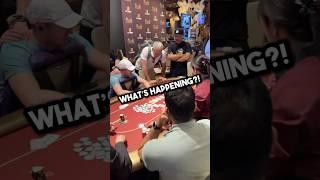 Okay what is happening at this poker table??