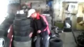 Guy Gets Blown In The Air By An Air Bag In A Tyre