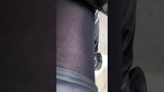 Emma Louise CD Thigh Boots Close up, with Black pantyhose and leather skirt