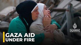 Israeli forces target Palestinians seeking aid in Gaza