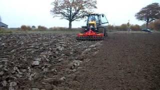 BRIX Frontpacker TWIN im Einsatz mit JCB und Sulky Drillmaschine