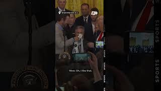 President Trump is gifted a Dodgers jersey as the World Series champions visit the White House