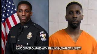 Louisville police officer charged with stealing $4,000 from suspect being booked into jail