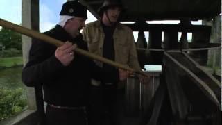 Battle Castle: host Dan Snow shoots a ballista at Caerphilly Castle