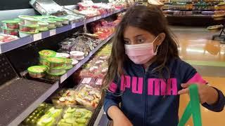 Deema teaches Sally Shopping for Healthy Food at the store