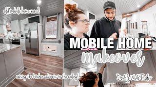 EXTREME DOUBLE WIDE KITCHEN REMODEL | raising the kitchen cabinets + new blinds | mobile home reno