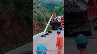 Tire Innovation! Workers Lower Poles Safely