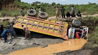 Due to overload, The brake failed and truck fell into the ditch and driver died. Fully restoration
