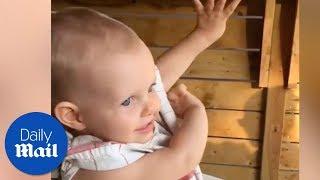 Cute baby dabs on command! - Daily Mail