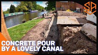 CONCRETING A WALL FOUNDATION ON A CANAL