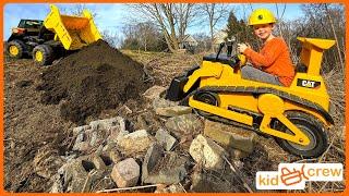 Paving rocky slope with kids ride on dump truck, bulldozer, and side by side. Educational | Kid Crew