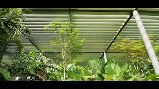 Lush and useable green roof garden thanks to fixed louver shades, Paramit factory