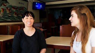 她在哥伦比亚开了一家中餐馆，攒下的钱够把儿子送去美国读本科