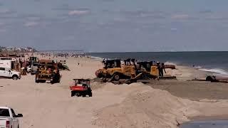 Sand machine and pipe being installed at Carolina Beach @mlodata