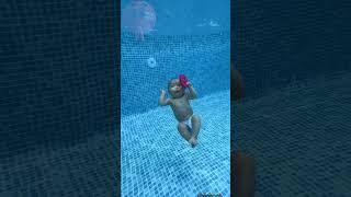 Cute Baby swimming in pool 