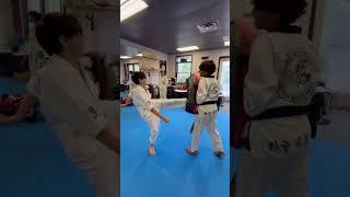 Whitebelt boy tries to kick a target. #taekwondo #class #workouts #school #punch #martialarts #teens