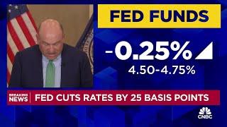 Federal Reserve cuts interest rates by a quarter point