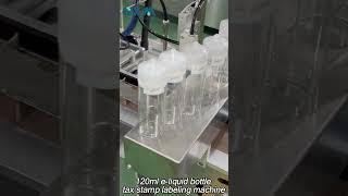automatic 120ml e-liquid bottle tax stamp labeling machine#labelingmachine #shortvideo #foryourpage