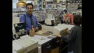 Working the CD counter at a Vibes music store in 1996