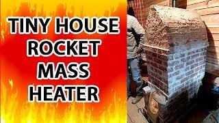 Tiny House Rocket Mass Heater - the Cyclone by Kirk "Donkey" Mobert has no barrel!