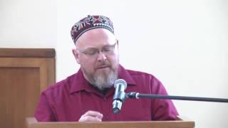 Imam Shane Atkinson offers comments at multi-faith celebration in honor of Martin Luther King, Jr.