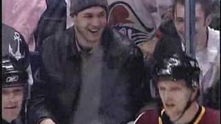 Fan taunting a Hockey Player