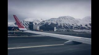 Landing in Longyearbyen, Svalbard,full HD. Scenic flight over the northernmost capital in the world.