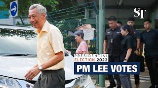 Prime Minister Lee Hsien Loong casts his vote for Singapore’s 9th president