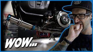 Installing A Tomei Titanium Exhaust On An Evo 9 | A Work Of Art