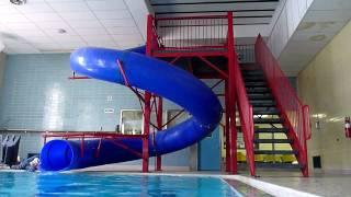 3yo William going down the YMCA pool slide