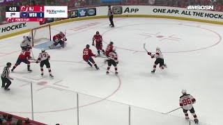 Dougie Hamilton scores a goal against the Washington Capitals