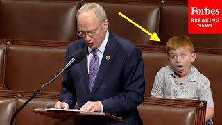 VIRAL MOMENT: John Rose’s Son Steals The Show Making Funny Faces Behind Dad’s House Floor Speech