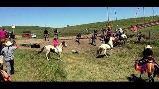 Lakota warriors push back police line at pipeline protest