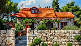 Front Yard Landscaping of a Rustic Stone-Walled House