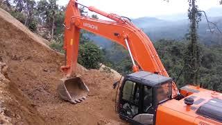 Hitachi Zaxis 350 LCH excavator making path in quarry