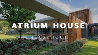 Step Inside the Enchanting Atrium House: Where Nature Meets Contemporary Living (House Tour)